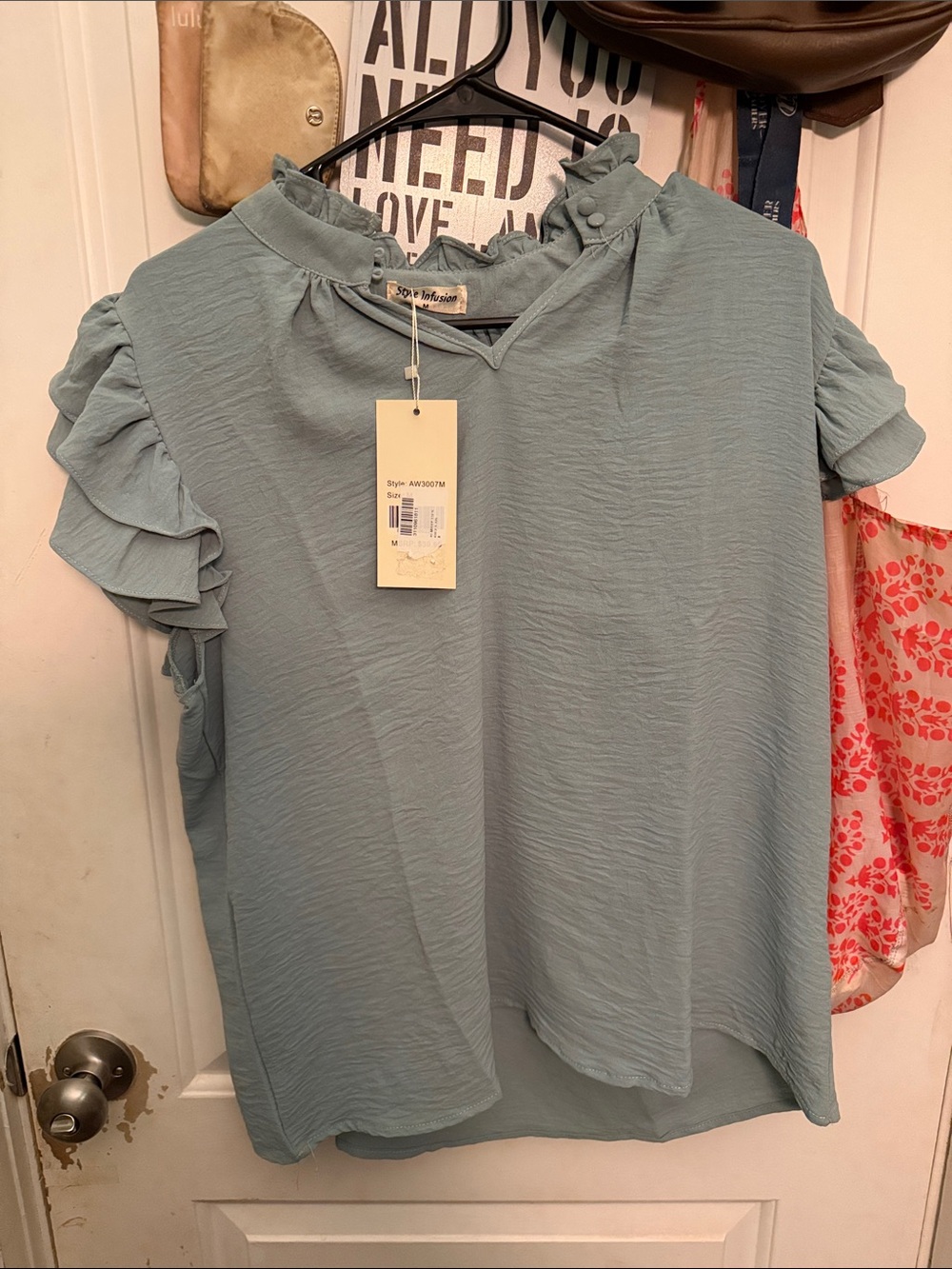 Light Blue Ruffle Sleeve Blouse by Sophia & Lee